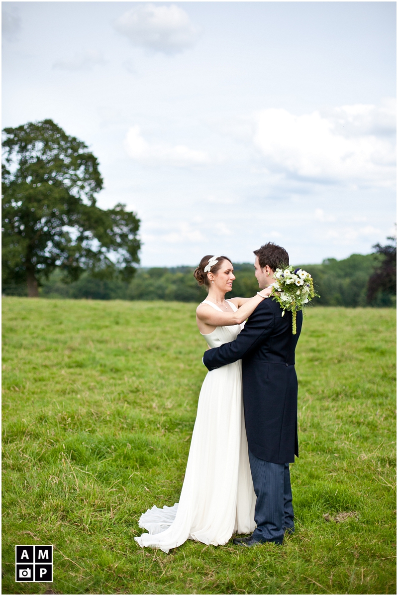 "Wedding-photos-in-a-field-at-Wasing-Park"