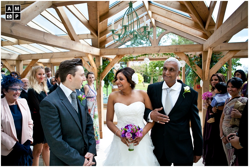 "Excited-bride-and-groom-Gaynes-Park-Orangery"