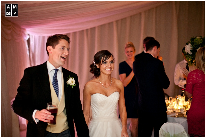 "bride-and-groom-entering-marquees"