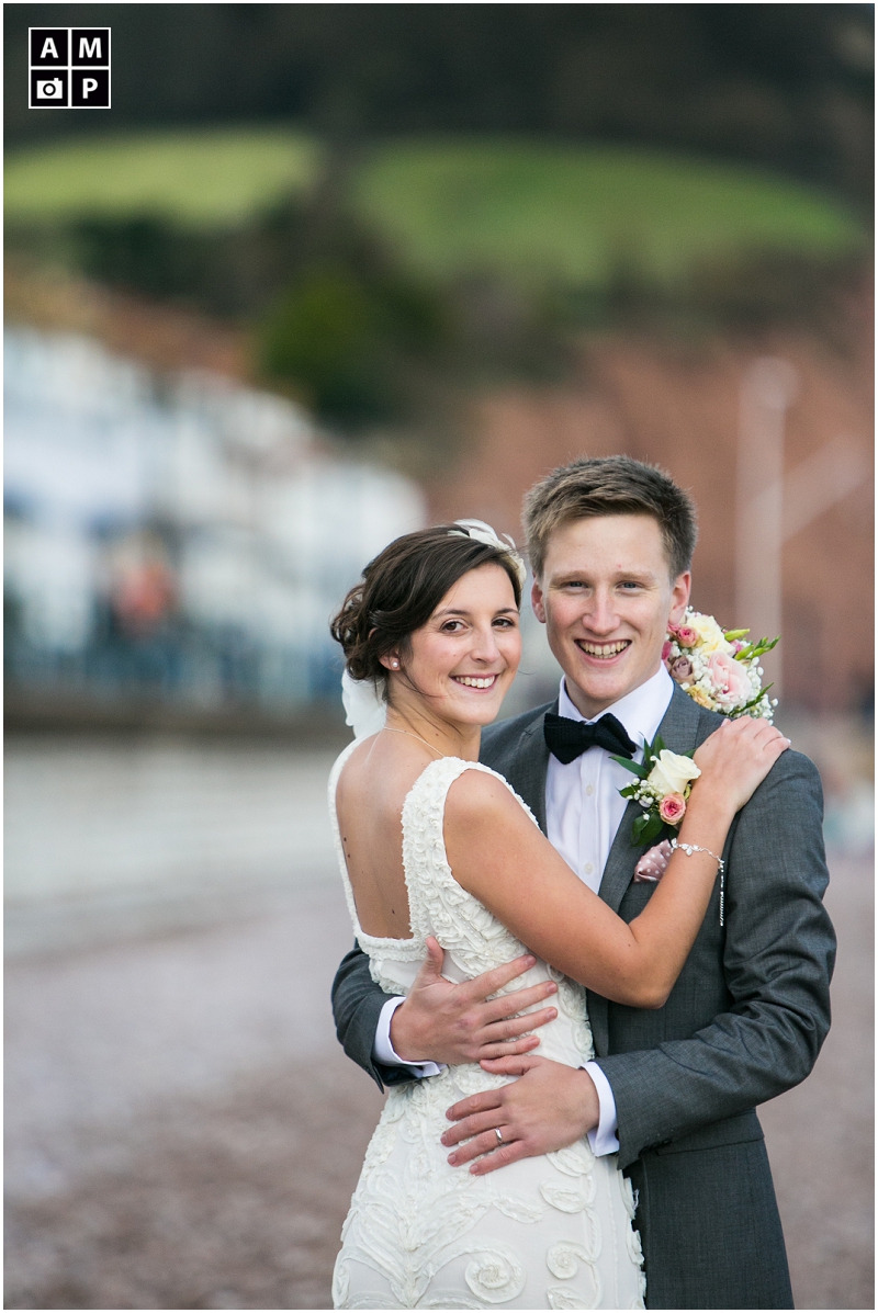 "vintage-bridal-couple-photos-on-the beach-in-Devon"