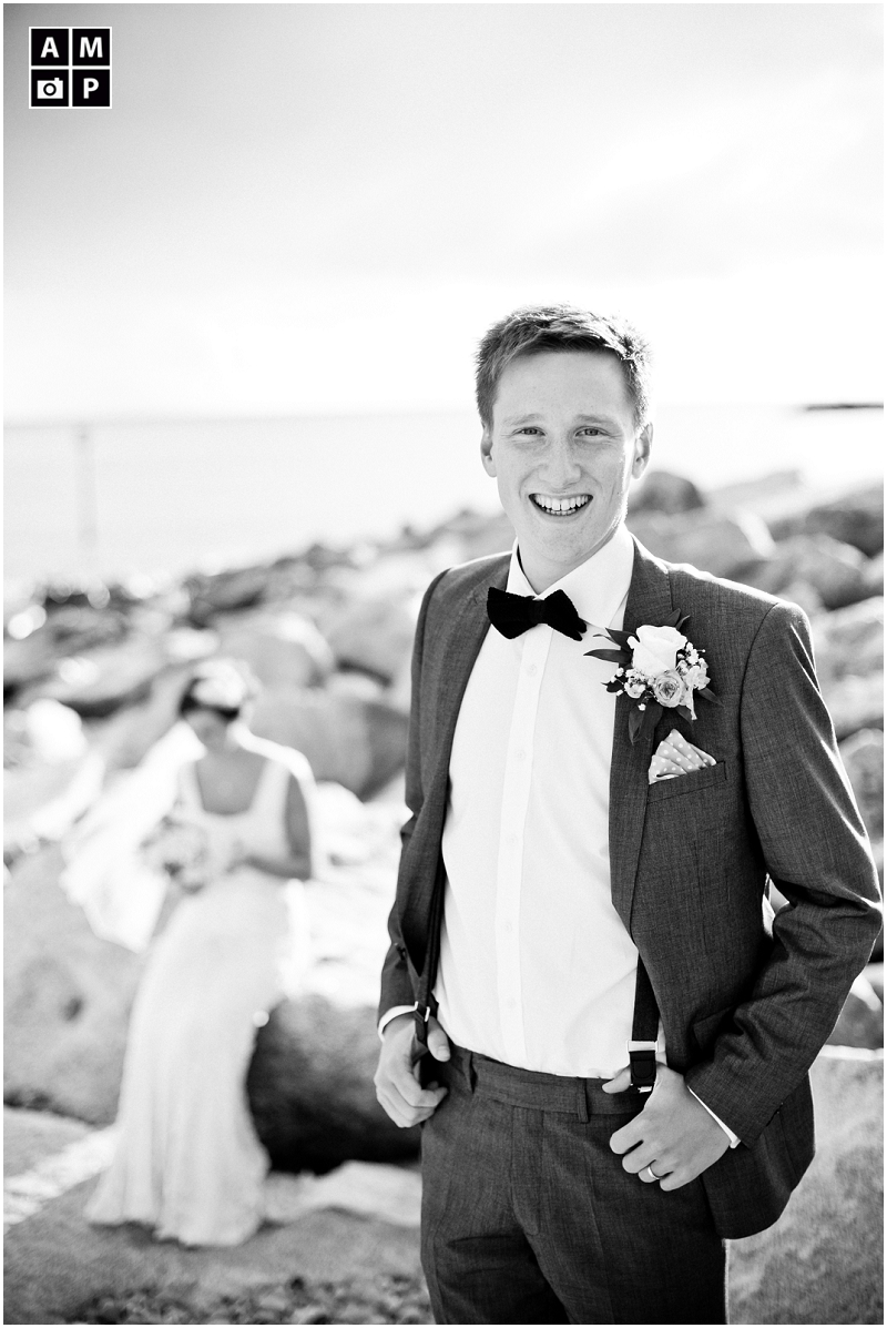 "groom-wearing-a-bowtie-on-the-beach"
