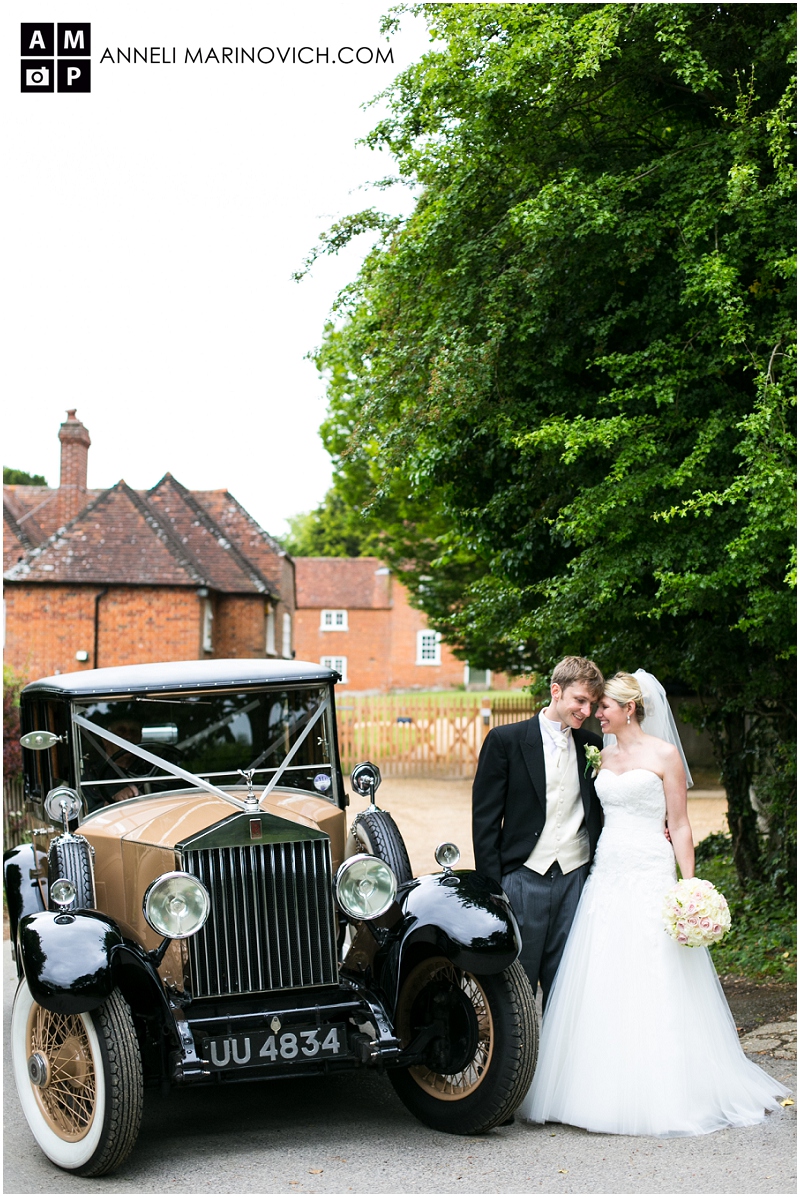 "vintage-Rolls-Royce-with-bride-and-groom"