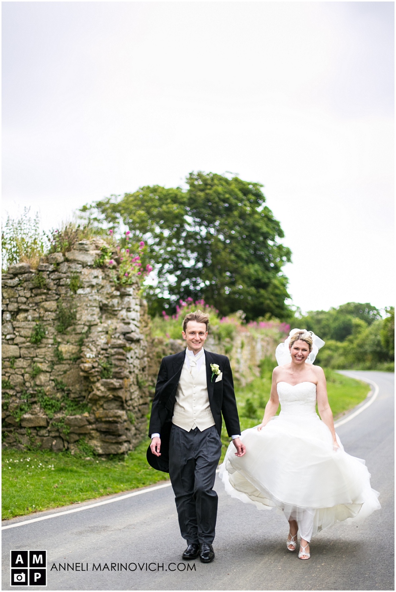 "bride-and-groom-in-a-country-lane"