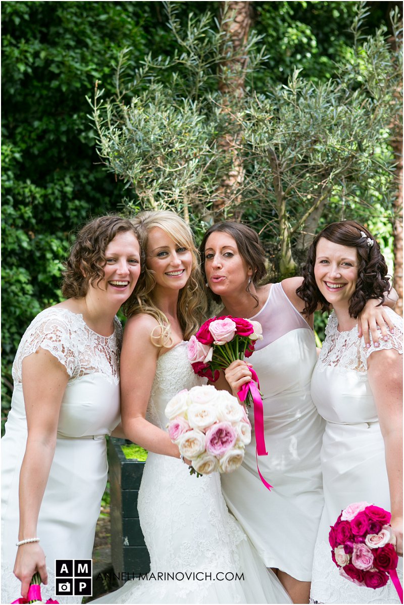 "bride-with-bridesmaids-at-hampton-court-house"