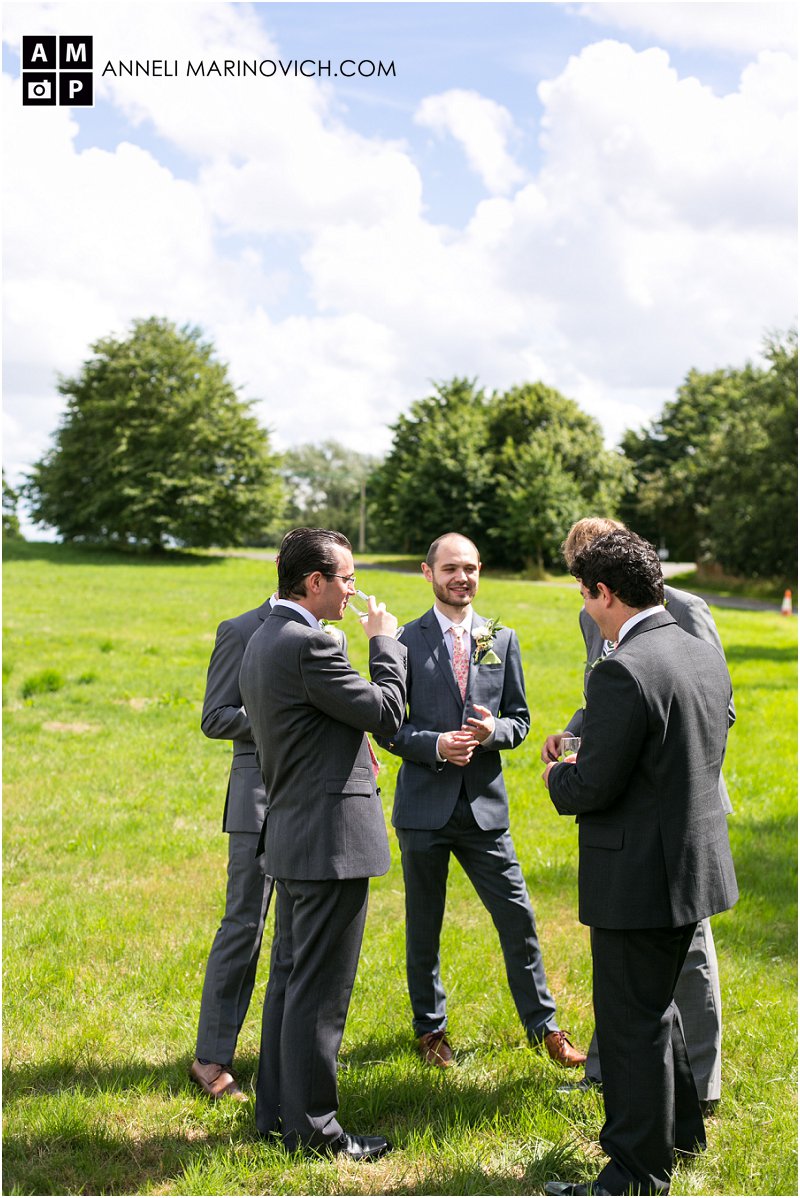 "groom-with-ushers-in-a-field"