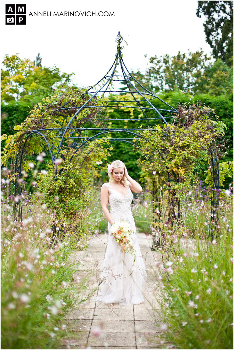"bride-in-Gaynes-Park-walled-garden"
