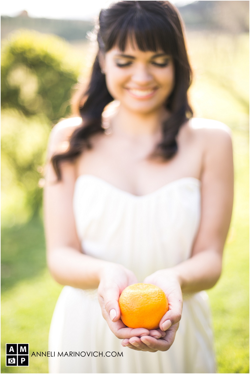 "bride-holding-an-orange"