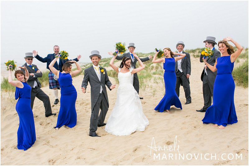"fun-wedding-party-photography-on-the-beach"