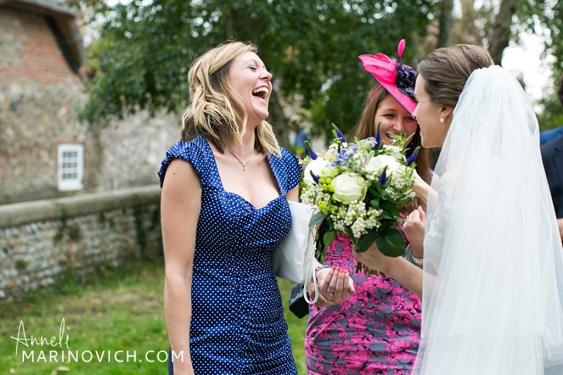 "bride-with-friends-laughing"