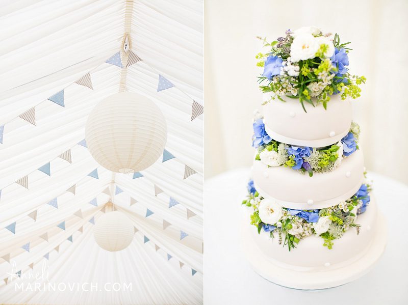 "beautiful-wedding-cake-and-blue-bunting"