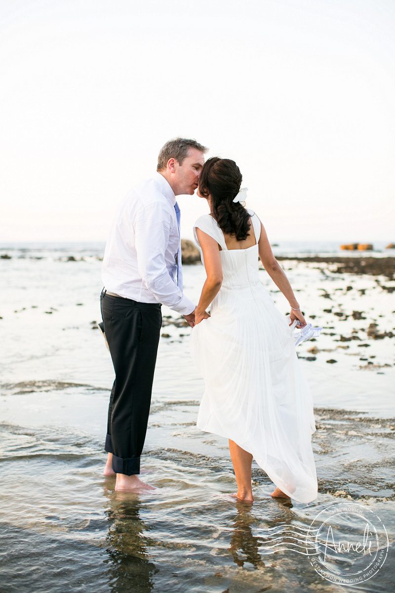 "Destination-wedding-couple-barefoot-in-the-ocean-Malta"