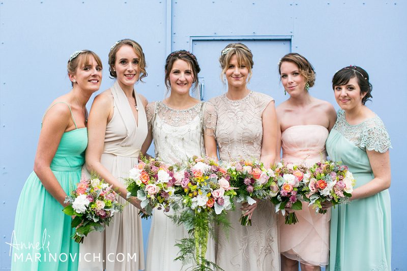 "Fazeley-Studios-bride-and-bridesmaids-with-powder-blue-doors"
