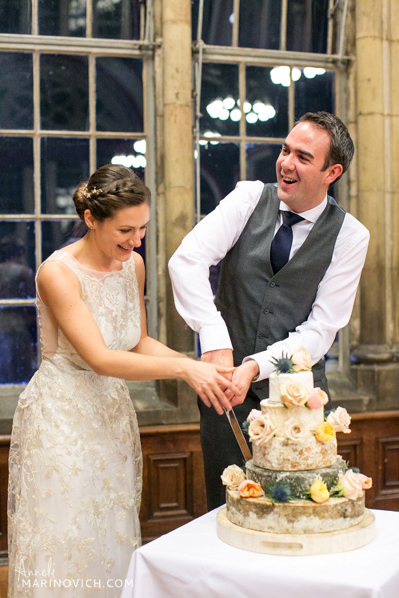 "Dulwich-College-wedding-couple-cutting-the-cake-Anneli-Marinovich-Photography-423"