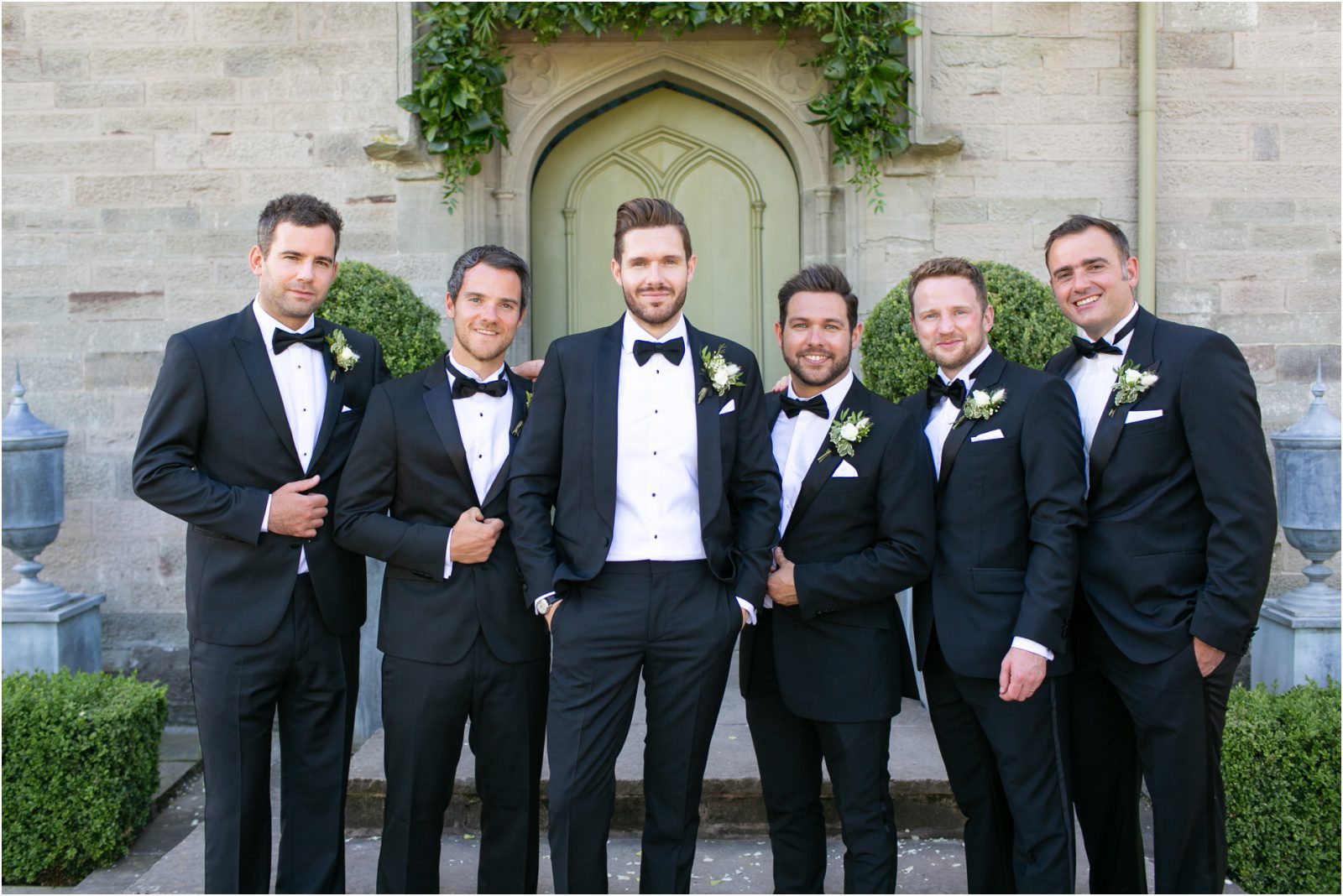 Grooms party wearing tuxedos