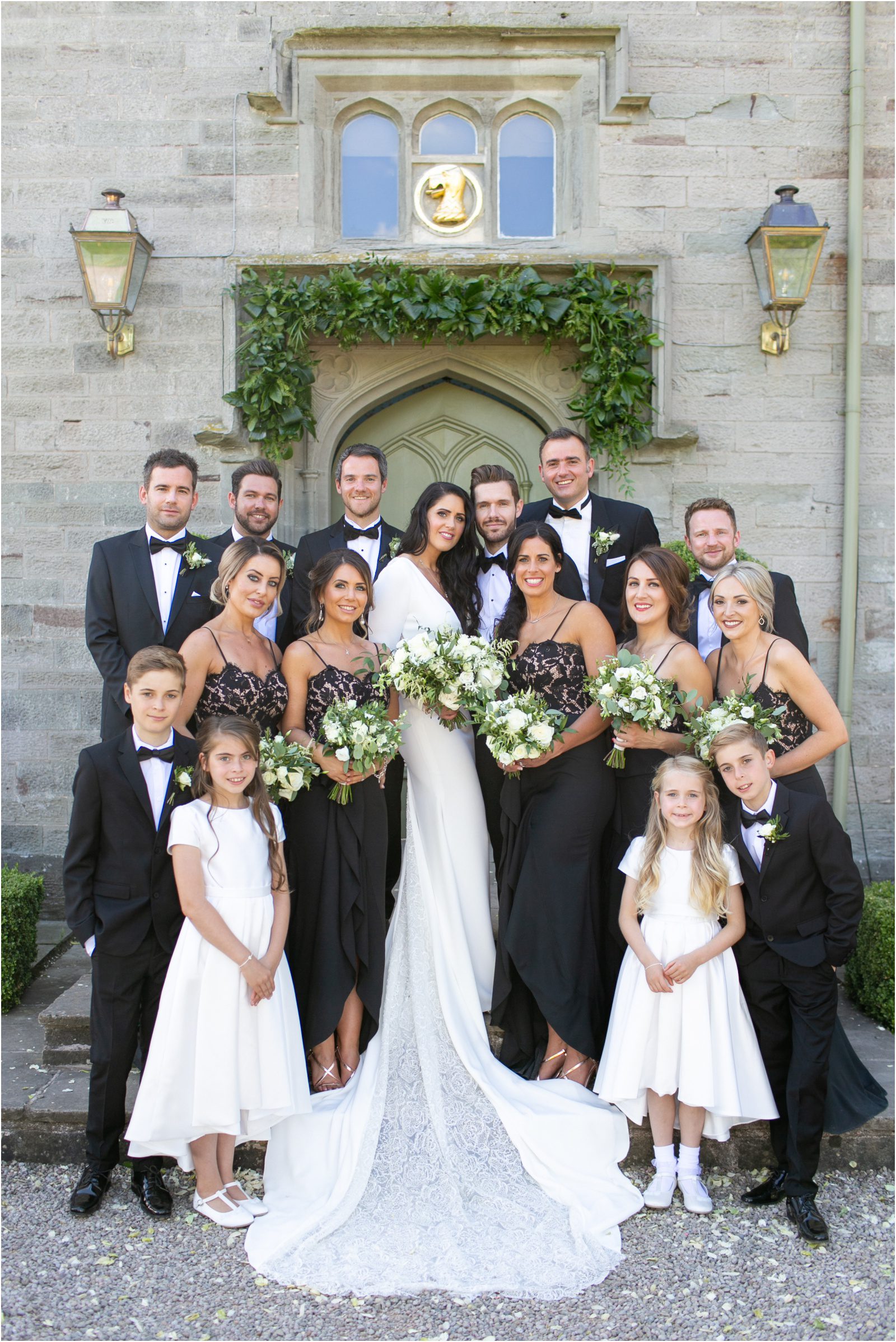 Bridesmaids wearing black dresses for a black tie wedding
