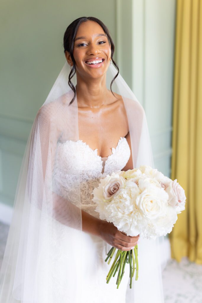 Pronovoas Bride with all white bouquet